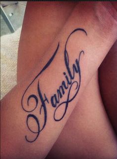 a woman's foot with the word family tattooed on her left leg, and an arrow in the middle