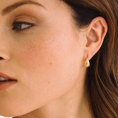 Liven up your looks with our Aubrey Vermeil Huggies. These dazzling earrings will be sure to turn heads – and hearts! Crafted with fine materials, our huggies are perfect for any occasion. Available in 14k gold vermeil and rhodium plated sterling silver Hoop size: 1/2" Hoop width: 1/4" at widest point Hinged closure SKU: BYE1146 Gold Teardrop Huggie Earrings Fine Jewelry, Classic Teardrop Huggie Earrings For Everyday, Fine Jewelry Teardrop Huggie Earrings, Yellow Gold Teardrop Hoop Earrings For Everyday, Formal Teardrop Huggie Earrings, Gold Drop Hoop Earrings Fine Jewelry, Everyday Yellow Gold Teardrop Hoop Earrings, Minimalist Teardrop Huggie Earrings For Anniversary, Tarnish Resistant 14k Gold Teardrop Huggie Earrings