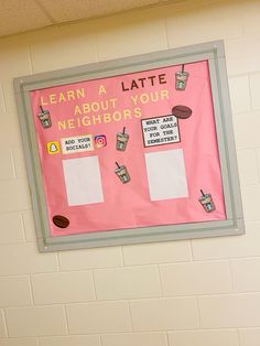 a bulletin board on the wall in a classroom