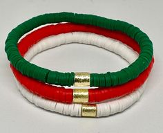 Set of 3 Red Green and White, hand beaded, stretch bracelets. Each strand is made with 6mm Heishi beads with gold accent bar. Can customize with wording of your choice. Bracelets Heishi, Heishi Bracelets, Holiday Bracelets, Kids Bracelets, Christmas Bracelet, Bracelet Ideas, White Hand, Heishi Beads, Gold Accent