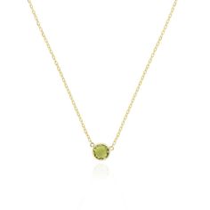 Our green topaz single bezel necklace adds a fun pop of color to your layered look! Also the perfect birthstone piece for an August baby! 14K Yellow Gold 1 Round PeridotMeasures: 6 millimeters Adjustable Chain Length: 15-16-17 inchesSpring Ring Clasp // Green Necklace With Bezel Setting For May Birthstone, May Birthstone Yellow Gold Necklace With Round Stone, Yellow Gold Birthstone Necklace With Round Stone For May, Yellow Gold Birthstone Necklace For May With Round Stone, Yellow Gold Birthstone Necklace For May, Green Gemstone Birthstone Necklace In 14k Gold, 14k Gold Green Birthstone Necklace, Green Round Stone Necklace For May Birthstone, Green May Birthstone Necklace With Round Stone