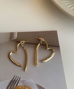 Casual Stylish Gold Copper Overgild Love Hoop EarringsMade of fine Copper Overgild Love.Measurement: 3.6cm/1.404" * 2.2cm/0.858". Matches easily with daily hairstyle, dresses & Shirts Gold Hoop Heart Earrings For Party, Gold Heart Hoop Earrings For Party, Metal Hoop Earrings For Valentine's Day, Valentine's Day Gift Metal Hoop Earrings, Valentine's Day Anniversary Metal Hoop Earrings, Gold Hoop Earrings For Valentine's Day Party, Gold Metal Hoop Earrings For Valentine's Day, Valentine's Day Open Heart Hoop Earrings, Gold Heart-shaped Metal Hoop Earrings