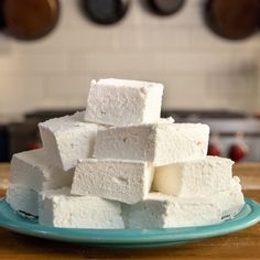 there are many pieces of marshmallow on the plate and one is stacked high