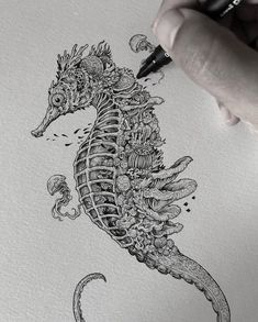 a black and white drawing of a seahorse with many different things in its body