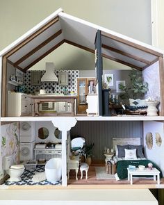 a doll house with furniture and accessories in it's interior, as well as the kitchen