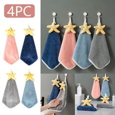 four towels hanging on the wall with starfishs attached to them and three different colors