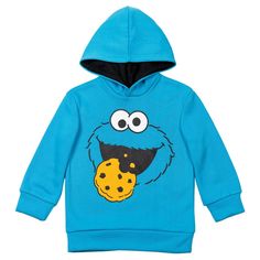 Can you tell me how to get Sesame Street? Dress your little one in this adorable Street hoodie and watch them learn play with their favorite puppet character. This warm cozy blue features a bright cheerful print of Cookie Monster smiling eating cookie. Made from soft material that keeps kid comfortable, cute pullover sweatshirt is part the perfect outfit for fun day play. Sesame Street Dress, Puppet Character, Winter Essentials Clothes, Elmo And Cookie Monster, Sesame Street Cookies, Sesame Street Cookie Monster, Oscar The Grouch, Back To School Fashion, Street Kids