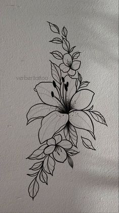 a black and white drawing of flowers on a wall