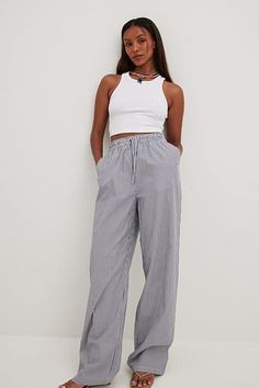 Elastic Waist Linen Trousers White | NA-KD Chic Wide Leg Pants With Drawstring And Relaxed Fit, Chic Wide Leg Pants With Drawstring In Relaxed Fit, Relaxed Fit Cotton Pants With Tie Waist, Summer Wide Leg Pants With Drawstring For Work, Summer Wide Leg Drawstring Pants For Work, Cotton Wide Leg Pants With Tie Waist For Work, Chic Drawstring Cotton Pants, Trendy Cotton Bottoms With Tie Waist, Trendy Pants With Tie Waist