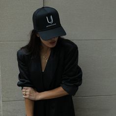 Show off your UJ obsession with our Uncommon James Hat. This black trucker hat features our iconic logo and looks good with everything. For a full look, make sure you get our Uncommon Sweatshirt and Unlikely To Apologize Sweatshirt. Want more styles? Shop our full apparel line. Urban Black Trucker Hat With Letter Print, Curved Bill Snapback Hat For Streetwear, Casual Black Baseball Cap For Fall, Black Trucker Hat For Spring Streetwear, Black Trucker Hat For Streetwear In Spring, Black Snapback Hat For Fall, Urban Snapback Hat For Spring, Fall Streetwear Baseball Cap, Fall Streetwear Baseball Cap With Curved Brim