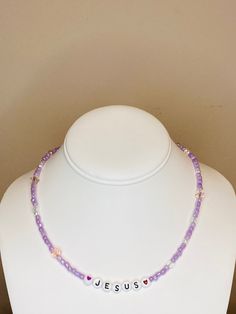 If another seed bead color is wanted, please message me. I have a variety of seed bead colors Seed Beads are lavender in this picture Clear and pink crystals Name beads are acrylic Crystal Names, Funky Necklace, Necklace Christian, Faith Necklace, Y2k Necklace, Christian Necklace, Gold Bead Necklace, Beaded Keychains, Seed Bead Necklace