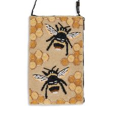 "Stay happy and free just like the bees!  This versatile bag can be used as a crossbody bag, wristlet, or unclipped by the strap to revamp into a purse on the go (just attach to belt loop or larger tote). Includes a convenient zipper enclosure on the side for easy access to cards or a cellphone. Each bag contains a 54\" crossbody strap that can be tucked away when not in use. Our Club Bags are changing the lives of over 1,000 people in Uttar Pradesh, India's poorest state. Your purchase makes a Company Bag, Animal Sanctuary, Stay Happy, Save The Bees, Pocket Book, Trading Company, Large Bag, Honey Bee, Hand Beading