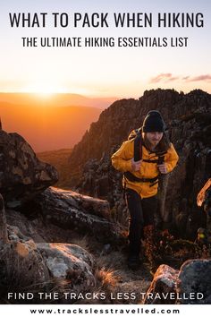 a man hiking in the mountains with text overlay that reads what to pack when hiking the ultimate hiking essentials list