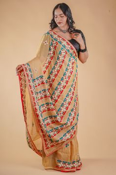 "Beige Hand Embroidered Lambani work Saree with blouse | Tusshar Silk Saree | Hand Work | Party Wear Silk Saree  Wedding wear saree, party wear saree, lambani work silk saree, hand embroidered saree, hand work saree. This is authentic hand embroidered lambani work Saree. The unique threadlambani embroidery design is entirely handcrafted by our skilled artisans. The most significant aspect of hand embroidery is the beautiful flower motif pattern. The running blouse piece is included with this pre Traditional Embroidered Chanderi Pre-draped Saree, Traditional Fitted Pre-draped Saree For Navratri, Traditional Pre-draped Saree With Cutdana For Festivals, Transitional Pre-draped Saree With Cutdana For Traditional Ceremonies, Traditional Embroidered Pre-draped Saree For Festive Occasions, Semi-stitched Chinon Saree With Motifs, Embroidered Chanderi Pre-draped Saree For Puja, Traditional Pre-draped Saree With Zari Work For Transitional Season, Traditional Wear With Motifs For Puja During Navratri