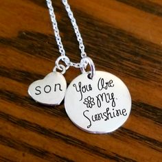 New Handmade Son, You Are My Sunshine Necklace Silver Plated Engraved Charm Pendant Reds 'You Are My Sunshine' Silver Plated Son Heart Charm 18 Inch Silver Plated Chain Lobster Clasp Closure Ships Within 24 Hours Of Purchase Monday-Saturday * Mother's Day Gifts, Gifts For Mom, Mom Gifts, Mom Gift, Mom Jewelry, Mom Son Jewelry Inspirational Silver Charm Necklaces For Mother's Day, Inspirational Silver Charm Necklace For Mother's Day, Customized Silver Necklace For Everyday, Inspirational Silver Charm Necklace For Mom, Customized Silver Charm Necklaces For Everyday, Inspirational Silver Necklace For Father's Day, Customized Silver Meaningful Necklace, Customized Silver Necklace With Meaningful Style, Dagger Necklace