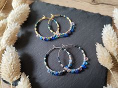 These delicate hoops are made with high quality Japanese Miyuki glass beads. The hoop diameter is 2.5 cm / 0.98 inches. You can choose between silver (surgical steel) and gold (gold plated) hoops. - made with high quality Japanese Miyuki beads - made with tearproof weaving thread Please note, that due to monitor settings and lighting differences the actual product may appear slightly different in its colors. You can find other color options for these earrings here: https://www.etsy.com/shop/Baff Handmade Blue Beaded Small Hoop Earrings, Blue Hoop Beaded Earrings With Tiny Beads, Blue Small Hoop Beaded Earrings With Dangling Beads, Blue Hoop Earrings With Tiny Beads, Blue Small Hoop Earrings With Tiny Beads, Blue Small Hoop Earrings For Festival, Blue Bohemian Hoop Earrings With Tiny Beads, Bohemian Blue Hoop Earrings With Tiny Beads, Blue Dangle Hoop Earrings With Tiny Beads