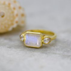 Custom handmade jewelry.Vintage Rainbow Moonstone Engagement Ring Marquise Moissanite Ring Art Deco Bridal Promise Ring June Birthstone Ring Bridesmaid Gift Jewelry ►Gemstone:  Natural Moonstone  ►Base Metal: 18k Gold Vermeil ►Gross Weight - 2.5 gm ★Gemstone size: ★ Stone - 8*10 mm ★ Stone Weight- approx. 3.5 carat ► Band measure- ★Band measurements: approx. 1.8mm wide, approx. 1.5mm thick ♥ Packaging: All jewelry comes in a beautiful and careful packaging 🛍 If the item is going directly to the Engagement Ring Rectangle, Rainbow Moonstone Engagement Ring, Ring Rectangle, Gold Ring Engagement, Rectangle Ring, June Birthstone Ring, Ring Marquise, Moonstone Engagement, Bridesmaid Gifts Jewelry