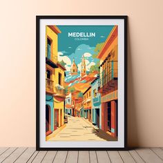 a framed poster with the name medellin in front of an old street scene