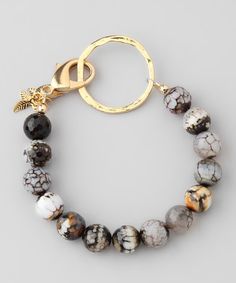 Work the wrist! Fashioned with spherical agate stones and an exaggerated 24-karat gold-plated clasp with 18-karat gold-plated leaf embellishments, this slender bracelet is an elegantly elusive accent. (scheduled via http://www.tailwindapp.com?utm_source=pinterest&utm_medium=twpin&utm_content=post185217945&utm_campaign=scheduler_attribution) Charm Bracelet Tutorial, Beaded Jewelry Bracelets, Bracelet Charms, Boho Bracelet, A Bracelet, Bead Charm Bracelet, Sea Glass Jewelry, Bijoux Diy, Jewelry Creation