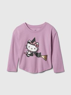 a hello kitty t - shirt with a broom on it