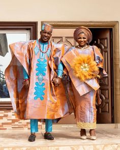 This beautiful burnt orange and blue attire is made from Asooke from the western part of Nigeria, mostly worn to traditional occasions and speak class in all ramification owing to the great sewing techniques and finishing put into it. It is very suitable for a wedding dress and give you that royal and classy look. We can also customize it in any colour of your choice. The female attire consists of 1. Skirt 2. Blouse 3. headgear (or Autogele) 4. shoulder shash. The male attire consists of 1. Agba Brown Traditional Wear With Patterns For Wedding, Traditional Brown Wedding Sets, Orange Unstitched Blouse Wedding Sets, Blue Traditional Wear For Ceremony, Navy Blue And Burnt Orange Wedding Black People, Burnt Orange Native Styles For Men, Orange Nigerian Wedding Dress, Burnt Orange Nigerian Traditional Wedding, Women Suits Wedding