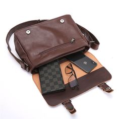 Because we know many people rather take their tablet with them instead of a more bulky laptop, we brought the Mini Scholar Retro to you. A light and elegant leather bag that will hold most of your essentials whether you're attending a meeting or a conference. Tablet bag Buckle hasp fastening PU leather and polyester Comes in 3 colors Dimensions: 33x28x8cm Rectangular Laptop Bag For Office, Portable Rectangular Laptop Bag For Office, Portable Rectangular Office Laptop Bag, Office Laptop Shoulder Bag, Portable Rectangular Satchel For Office, Portable Leather Shoulder Bag For School, Modern Office Shoulder Bag, Leather School Shoulder Bag, Portable Leather Satchel For Everyday Use