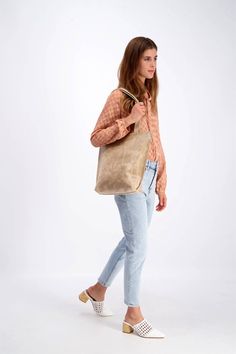 This classic MAYKO Leather Tote Bag is a gorgeous everyday tote. It can handle your daily tasks and activities with ease. Handmade by a high class artistry from 100% Genuine Italian Leather and has a simple yet elegant design that will complement your everyday casual stylish look. #Bag #Fashion #Style #Outfit #Women'sFashion #Women'sStyle #Women'sBag #Women'sHandbag #Design #Designer #FashionDesign #Leather #LeatherBag #DesignerBag #LuxuryBag #Travel #TravelBag #SchoolBag #Art #Minimalist Leather Diaper Bag Backpack, Classic Leather Tote, Beige Tote Bag, Woman Shoulder, Beige Tote, Booties Outfit, Soft Leather Bag, Laptop Bag For Women, Minimalist Women