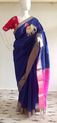 "Gorgeous royal blue and pink semi silk saree with intricate elephant hand embroidery and silk brocade unstiched blouse in pink with matching elephant weave. The hot pink color of the blouse is simply stunning when paired with royal blue of the saree. Beautiful elephant zardosi work makes this a stunning piece. Saree length 5.5 meters Blouse fabric 1 meter 44\" wide Saree ships in 2-3 days of payment.Shipping time is 4-5 days with tracking. We also offer blouse and petticoat stitching for saree Blue Slub Silk Blouse With Zari Weaving, Blue Traditional Wear In Slub Silk With Self Design, Blue Slub Silk Blouse Piece For Festivals, Blue Slub Silk Blouse Piece With Cutdana, Blue Slub Silk Blouse Piece With Self Design, Blue Unstitched Slub Silk Blouse Piece, Blue Slub Silk Unstitched Blouse Piece, Blue Raw Silk Blouse Piece With Self Design, Elephant Hand Embroidery