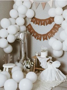 a birthday party with balloons and decorations