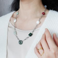 Unleash your urban mystique with the Metropolis Hermit jewelry collection. Featuring a captivating blend of natural gemstones and bold chains, each piece embodies the spirit of a modern-day hermit. Discover the allure of solitude and express your individuality with these edgy and sophisticated designs. ❀ Natural Jade, Jadeite, and Carved Cinnabar Auspicious Clouds❀ Natural Baroque Pearls❀ Natural White Agate Lotus Flower❀ Natural Jadeite Donut❀ Silver Plated Brass Chain and Sterling Silver Clasp❀ 21 Inch White Agate, Station Necklace, Natural Jade, Brass Chain, Natural Pearls, Baroque Pearls, Metropolis, Lotus Flower, Natural Gemstones