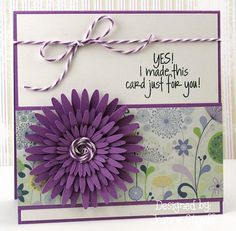 a close up of a card with a flower on it