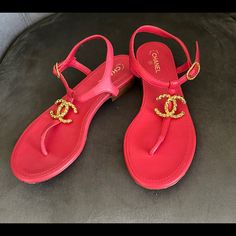 Beautiful Chanel Red Thong Flat Sandals With Gold Cc Logo Size 35.5 1/2. -Excellent Condition. Bottoms Were Wiped But Have Not Been Worn -The Color Is Red But Can Look Hot Pink In Pics -Comes With Dustbag -Serious Bidders Only! My Items Are 100% Authentic. Please Ask If You Have Additional Questions And/ Or Would Like More Photos. Luxury T-strap Sandals For Summer, Luxury T-strap Sandals For Beach, Designer Toe Post Sandals For Summer, Luxury T-strap Beach Sandals, Red T-strap Sandals For Beach, Red T-strap Sandals For The Beach, Luxury Summer T-strap Toe Post Sandals, Luxury Toe Post T-strap Sandals For Summer, Designer Beach Sandals With Heel Strap