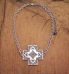 "Beautiful engraved silver metal cross pendant is 1 3/4\" x 1 3/4\" on short 15 1/2\" chain w/ lobster clasp & 5\" ext. chain. Free shipping." Nickel-free Metal Cross Pendant Jewelry, Nickel-free Metal Cross Jewelry, Oxidized Metal Cross Pendant Jewelry, Bohemian Sterling Silver Cross Jewelry, Adjustable Nickel-free Cross Pendant Jewelry, Engraved Adjustable Cross Pendant Jewelry, Adjustable Engraved Cross Pendant Jewelry, Silver Cross Metal Jewelry, Sterling Silver Cross Jewelry With Lobster Clasp