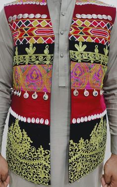 Here is an Afghan Kuchi Pashtun men handmade zari  silver embroidery work vest waistcoat. Traditionally such vests are used on special events like wedding Nikah and Mehndi event. Available in small, medium and large size. It contains very beautiful golden color threads embroidery work which is traditionally called "Zari or Tilai" embroidery work. Fabric is long lasting, comfortable and breathable. Traditional Nehru Jacket With Mirror Work For Festive Occasions, Traditional Sleeveless Kurta With Mirror Work, Sleeveless Traditional Wear With Mirror Work, Traditional Nehru Jacket With Intricate Embroidery, Traditional Sleeveless Nehru Jacket With Intricate Embroidery, Festive Vest With Multicolor Embroidery, Festive Embroidered Vest With Multicolor Embroidery, Festive Embroidered Multicolored Vest, Traditional Sleeveless Vest With Resham Embroidery