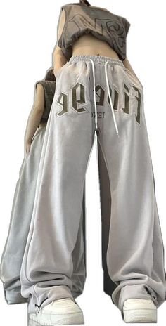 Gray Baggy Hip Hop Sweatpants, Gray Hip Hop Style Baggy Sweatpants, Gray Hip Hop Sweatpants For Streetwear, Gray Wide Leg Hip Hop Bottoms, Oversized Cotton Sweatpants For Sports, Athleisure Wide-leg Sweatpants For Streetwear, Gray Casual Sweatpants With Letter Print, Casual Gray Sweatpants With Letter Print, Gray Baggy Sweatpants For Leisure