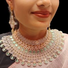 About the Jewellery Pastel Green Colour American Diamonds Choker Necklace Set By Asp Fashion Jewellery Complete your beautiful looks with this pastel green Color Choker Necklace set and get an overall gorgeous appearance. Wear it on special occasions and everyone with your looks. This necklace set is a perfect combination of traditional & contemporary design. Suitable for all Kinds of Dressy Occasions. . Make your moment memorable with this range. This jewel set features a unique one of a kind t Elegant Turquoise Wedding Sets, Elegant Green Gift Sets, Elegant Light Green Wedding Sets, Elegant Light Green Sets, Diamonds Choker, Radha Beauty, Diamond Choker Necklace, Traditional Contemporary, Diamond Choker