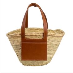 Handmade by craftswomen from our rural cooperative DOUM FOR WOMEN, our totes are made with impeccable craftsmanship and from high quality materials. Basket carryall bag as the perfect summer staple. Fresh, light and versatile tote with a rather rustic feel and a market vibe, ideal for strolling around in style from the beach to the city. This handwoven basket crafted from palm leaves is enriched with high-end classic vegan leather details, an exterior pocket and a removable canvas pouch with a z Paris Packing List, Paris Packing, French Basket, Cute Mini Bags, Moroccan Basket, Spring Summer Capsule Wardrobe, Moroccan Women, Straw Basket, Hand Woven Baskets