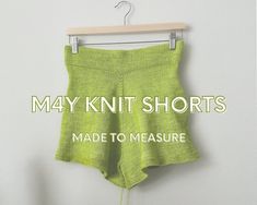 a pair of shorts hanging on a clothes hanger with the words, may knit shorts made to measure