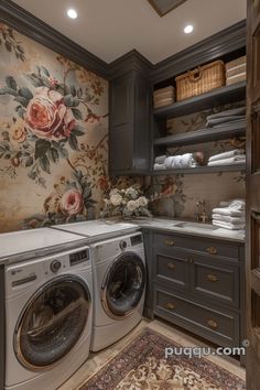 a washer and dryer in a room with floral wallpaper on the walls