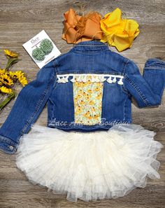 Elevate your little one's style with our custom-made denim jacket! Handcrafted with a vibrant floral sunflower pattern and beige tassels, this jacket is an eye-catching addition to any wardrobe. Available in size XS or 5Y, it's perfect for making a statement at any event. Shop now for fast shipping at our children's clothing boutique! custom-made denim jacket, floral sunflower pattern, beige tassels, children's boutique, fast shipping, unique party ready outfits Sunflower Jacket, Sunflower Denim Jacket, Blue Denim Outerwear With Custom Embroidery, Kids Jeans Jacket Custom, Baby Denim Jacket, Childrens Clothing Boutique, Custom Denim, Sunflower Pattern, Children's Boutique