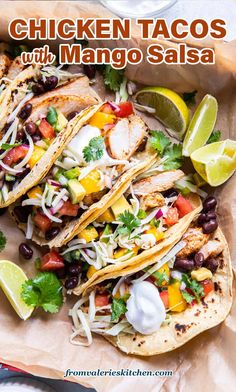 chicken tacos with mango salsa on top