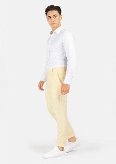 Crafted with a vibrant, cream yellow stretch cotton, these custom made pants are uniquely stylish and supremely comfortable, and will become a go to favorite when you're looking to stand out. Summer Slim Fit Straight Chinos, Slim Fit Tapered Leg Chinos For Summer, Slim Fit Tapered Leg Summer Chinos, Summer Slim Fit Tapered Leg Chinos, Slim Fit Cotton Chinos For Summer, Slim Fit Cotton Pants For Summer, Summer Slim Fit Cotton Chinos, Cream Tapered Leg Summer Pants, Fitted High-waisted Summer Chinos