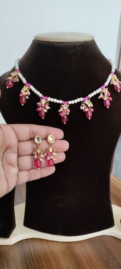 *Beautiful Premium Quality Kundan Choker With Pearls *Combination Of Kundan, Pearls *Quality Of Pearls Is Best *Comes With Matching Earrings *Front Side is Kundan With Pearls *Pearls And Kundan Are Of Original Quality *For More Beautiful Collection, Check At https://www.etsy.com/shop/placeoffashion *Necklace Fitting Is Adjustable *Earring Closure: Push Back **Necklace Closure : Beautiful Silk Thread *It is a Bridal or Partywear Set. *It Will Give You a Unique and Beautiful Look  *You Can Wear Th Pink Necklaces For Party And Festivals, Handmade Pink Kundan Necklace For Gift, Pink Kundan Necklace Gift, Pink Necklace For Festivals And Gifts, Pink Necklaces For Festivals As Gifts, Pink Necklaces For Festivals Gift, Pink Necklaces For Festivals And Gifts, Pink Choker For Festivals Gift, Pink Choker For Festivals And Gifts