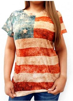 American Flag Print Ladies T-Shirt This American Flag western ladies crew neck t-shirt has:- Vintage American flag color print Short sleeves Crew neckline 90% Polyester 10% Spandex Machine wash cold, tumble dry low Red Americana T-shirt With American Flag, Multicolor Flag Print Casual T-shirt, American Style Tops With Flag Print And Short Sleeve, Patriotic Multicolor Short Sleeve T-shirt, American Style Flag Print Short Sleeve Top, American Style Short Sleeve Tops With Flag Print, Multicolor Casual Tops For Memorial Day, American Flag Print Tops For Independence Day, Casual Multicolor Top For Memorial Day