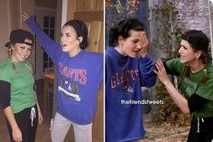 two girls in green and blue shirts standing next to each other with their hands up