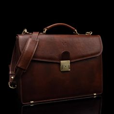 With unparalleled functionality in mind, we designed our No.1 Briefcase to be the perfect accompaniment to a style-conscious contemporary professional's everyday life. Inspired by the classics, the No.1 Briefcase is all about luxury and style that effortlessly finds its way into the modern day. Both smooth and sleek, this briefcase is expertly constructed in Northern Italy using only the finest premium Italian leather— certified full-grain vegetable-tanned cow leather. Fully lined with fine cott Luxury Cognac Briefcase For Business, Luxury Cognac Briefcase For Office, Luxury Cognac Briefcase For Formal Occasions, Luxury Cognac Briefcase For Work, Timeless Cognac Briefcase For Work, Luxury Brown Formal Briefcase, Modern Cognac Briefcase For Work, Luxury Brown Briefcase For Formal Occasions, Timeless Cognac Briefcase For Office