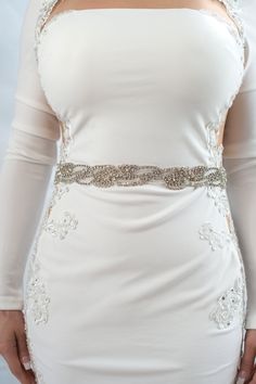 "this wavy crystal belt or sash is hand beaded with rhinestone and white clear glass beads. the beading goes all around your waist and the bridal belt close in the back with hook and eyes. perfect fitted sash for and after the wedding party. please select your waist size (which will be the length of the belt) in the drop menu. if you are in between sizes, please chose the closest and put a note at checkout with the exact measurement. you can also order this belt in standard size (which is 18\" o Elegant Beaded Bridal Belt, Elegant Beaded Fitted Bridal Belt, Silver Rhinestone Bridal Belt For Prom, Fitted Silver Crystal Bridal Belt, Bridal Belt With Rhinestones And Crystal, Fitted Bridal Belt With Rhinestones And Crystal, Fitted Crystal Bridal Belt For Party, Embellished Crystal Bridal Belt, Fitted Crystal Embellished Bridal Belt