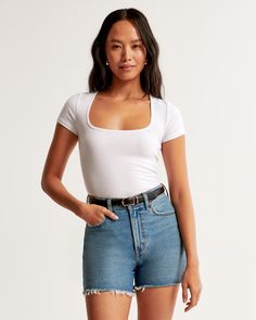 Elevate your wardrobe with the Abercrombie & Fitch Women's Featherweight Rib Tuckable Squareneck Top, a perfect blend of style and comfort. This top features:

- Size: XS
- Color: White
- Material: TENCEL™ Modal, Polyester
- Gender: Female
- Age Group: Adult

Designed for a slim fit, this short-sleeve top is crafted from a light, featherweight rib fabric that feels soft to the touch. The square neckline and all-over ribbed detail add a touch of elegance, while the straight hem allows for versati Classic Short Sleeve Top For Everyday Spring, Classic Fitted Short Sleeve Top In Solid Color, Classic Short Sleeve Top For Everyday Summer Wear, Classic Short Sleeve Top For Summer, Classic Solid Short Sleeve Top For Summer, Classic Fitted Short Sleeve Top For Summer, Everyday Relaxed Fit Short Length Tops, Everyday Relaxed Fit Short Tops, Fitted Short Sleeve Top For Everyday Spring Wear