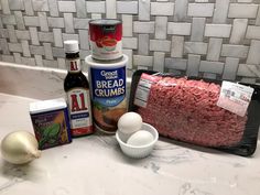 ingredients for meatloaf sitting on a counter top