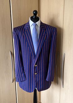 Up for sale is a stunning Mens blue striped ALEXANDRE boating  blazer jacket as shown in the pictures. The jacket is in superb used condition  The jacket is missing the size label but I would say it fits like a 46R and measures approx 24" armpit to armpit, 18" armpit to end of cuff, 21.5" shoulder to shoulder, 26" shoulder to end of cuff and 33" in length from the base of the collar. The jacket has two buttons on the front and two  vent split at the back Pinstripe Single Breasted Long Sleeve Sport Coat, Long Sleeve Pinstripe Single Breasted Sport Coat, Pinstripe Single-breasted Long Sleeve Sport Coat, Striped Long Sleeve Sport Coat For Formal Occasions, Striped Long Sleeve Sport Coat For Work, Size Label, Blue Man, Blue Stripes, Blazer Jacket